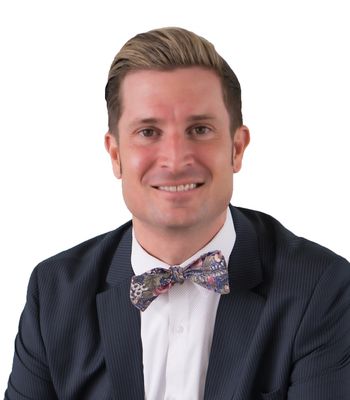 Portrait of Nicholas Buchanan, REALTOR®.